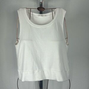 Samantha Eng. white sleeveless white tank with criss cross open back